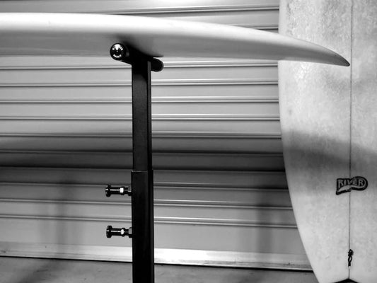 The G-Force Surfboard Glassing Rack holding a surfboard