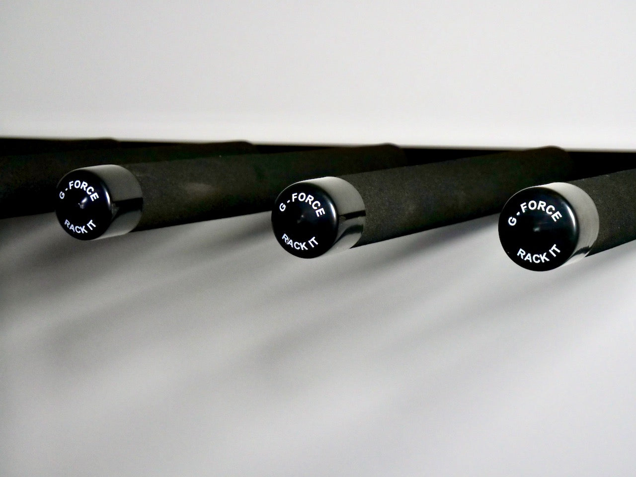 Close-up of the GFP5 5 Board Freestanding Rack bars without any surfboards