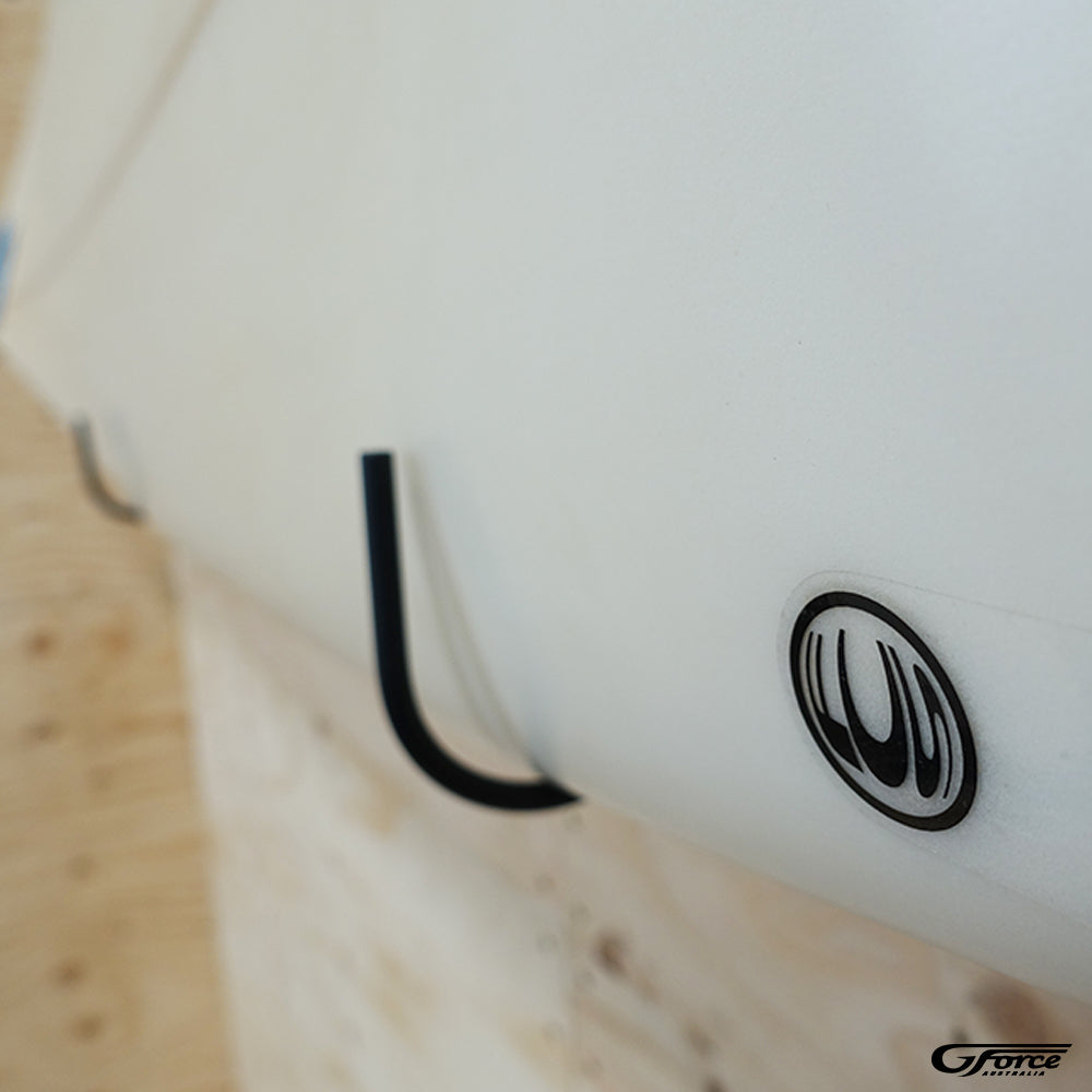 Close-up of the GF15H - Wall Mounted Surfboard Rack holding a surfboard