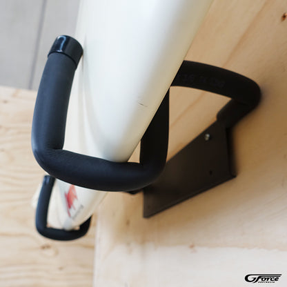 Close-up of the GF3P - Wall Mounted Surfboard Rack bars holding a surfboard
