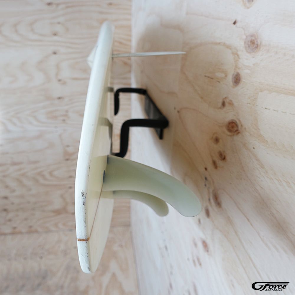 Side view of the GF3P - Wall Mounted Surfboard Rack bars holding a surfboard