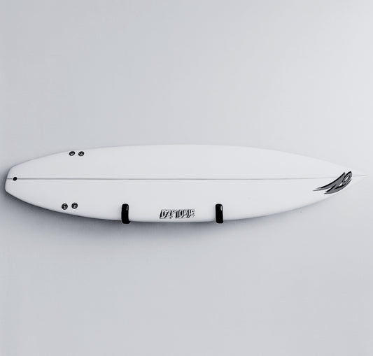 A surfboard on the G-Force GF5 Wall Mounted Surfboard Rack