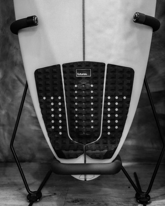 Closeup of a wakeboard in the G-Force freestanding wakeboard rack GF6FCS