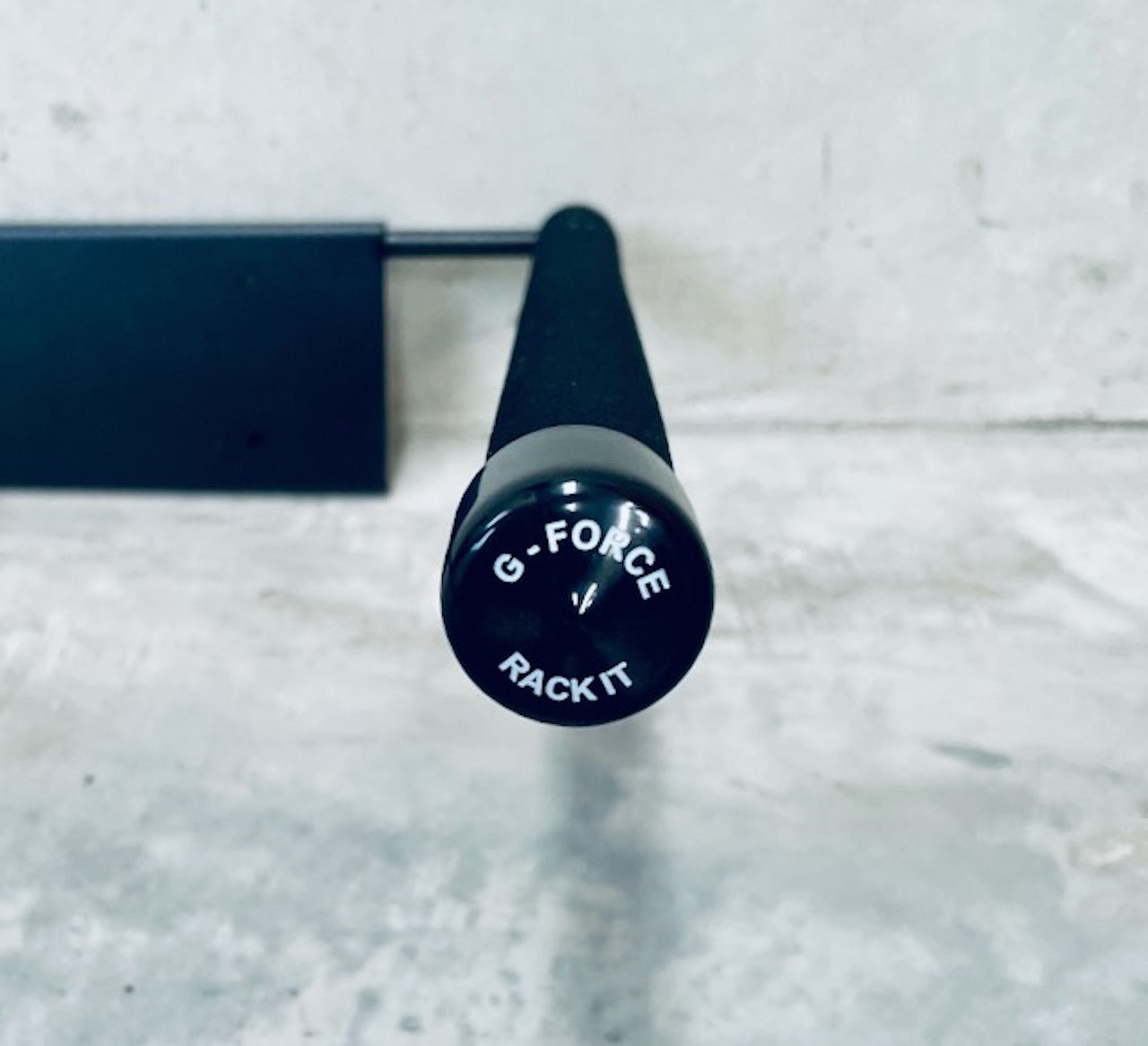 Close-up of a bar on the GF3F - Wall Mounted Surfboard Rack showing the G-Force logo