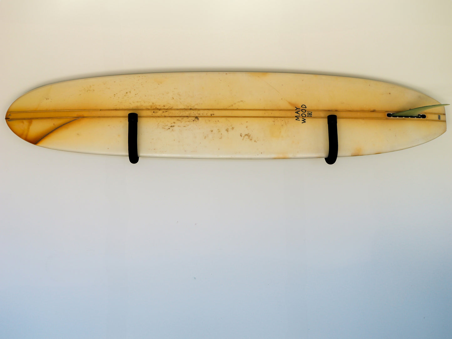 Front view of the GFSUP1 - Wall Mounted Stand Up Paddle Board Rack holding a stand up paddle board