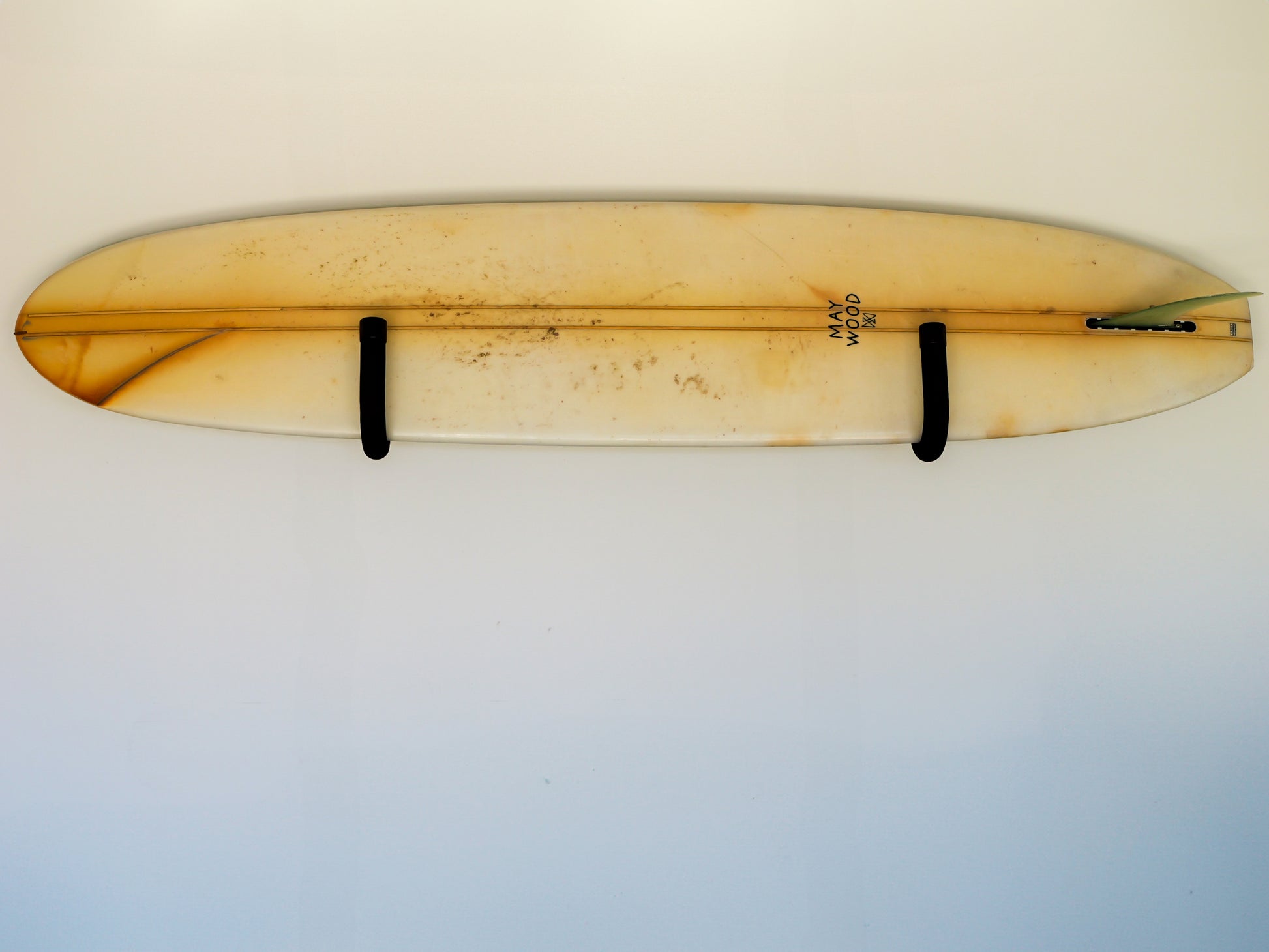 Front view of the GFSUP1 - Wall Mounted Stand Up Paddle Board Rack holding a stand up paddle board