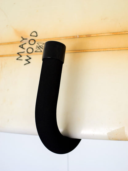 Close-up of a bar on the GFSUP1 - Wall Mounted Stand Up Paddle Board Rack holding a stand up paddle board