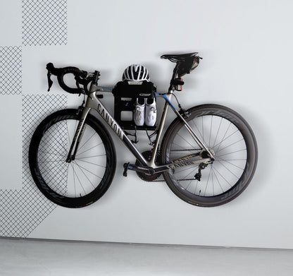 The G-Rack Model 2 - Wall Mounted Bike Rack holding a bicycle, helmet and shoes