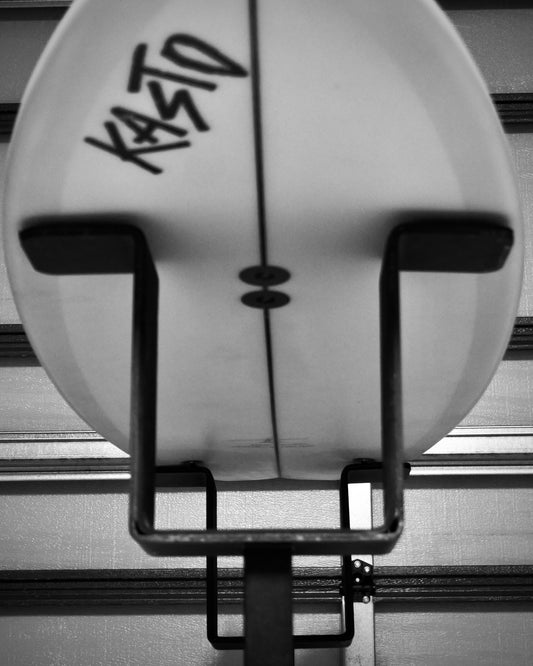 Surfboard lying on the G-Force Shaping Rack